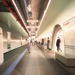 Stazione metro Spagna, un treno ATAC bianco attende passeggeri su un binario moderno.