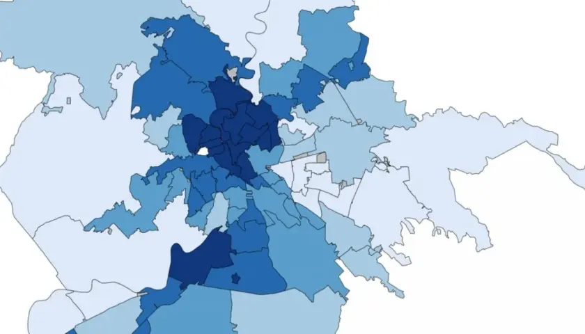 Mappa di Roma con quartieri colorati in diverse tonalità di blu, che indicano dati specifici per ogni zona.